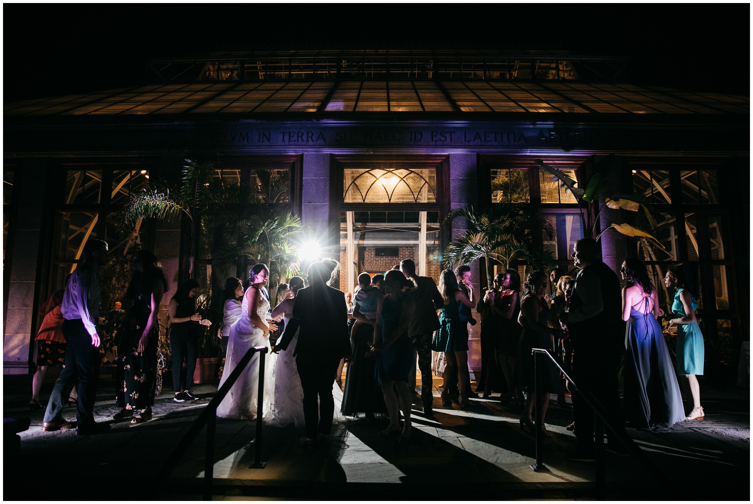 Guests dancing at Tower Hill Botanic Garden wedding reception in Massachusetts